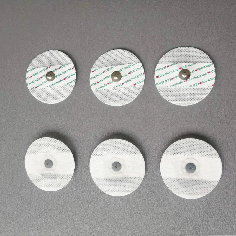 Disposable foam and nonwoven ecg electrode medical electrode pads