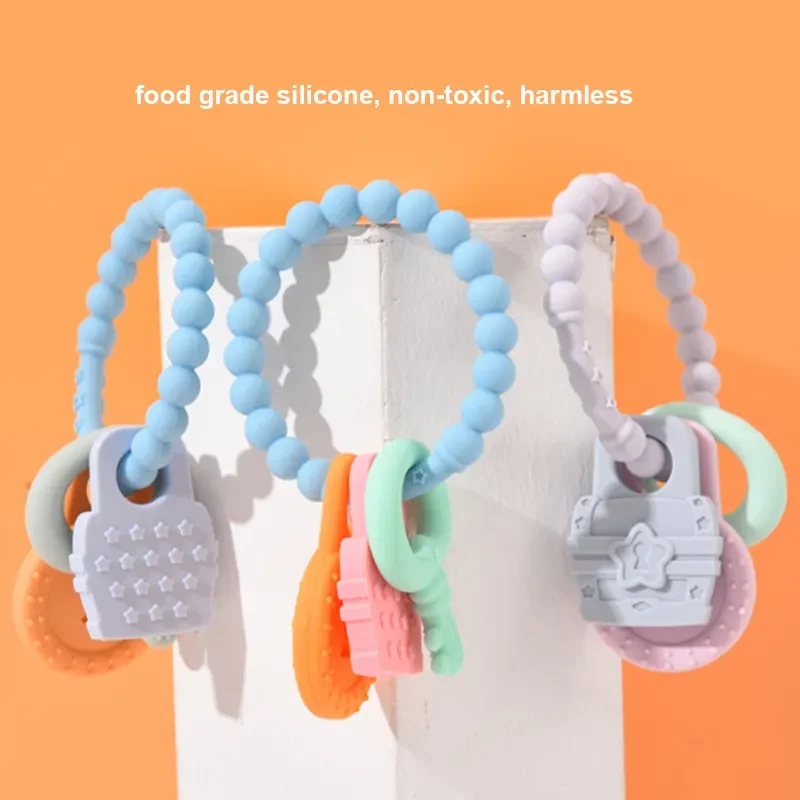 New Bpa Free Baby Silicone Teething Bracelets Key Teething Sticks Food Grade Silicone Dinosaur Rabbit Bunny Teether Baby Toys