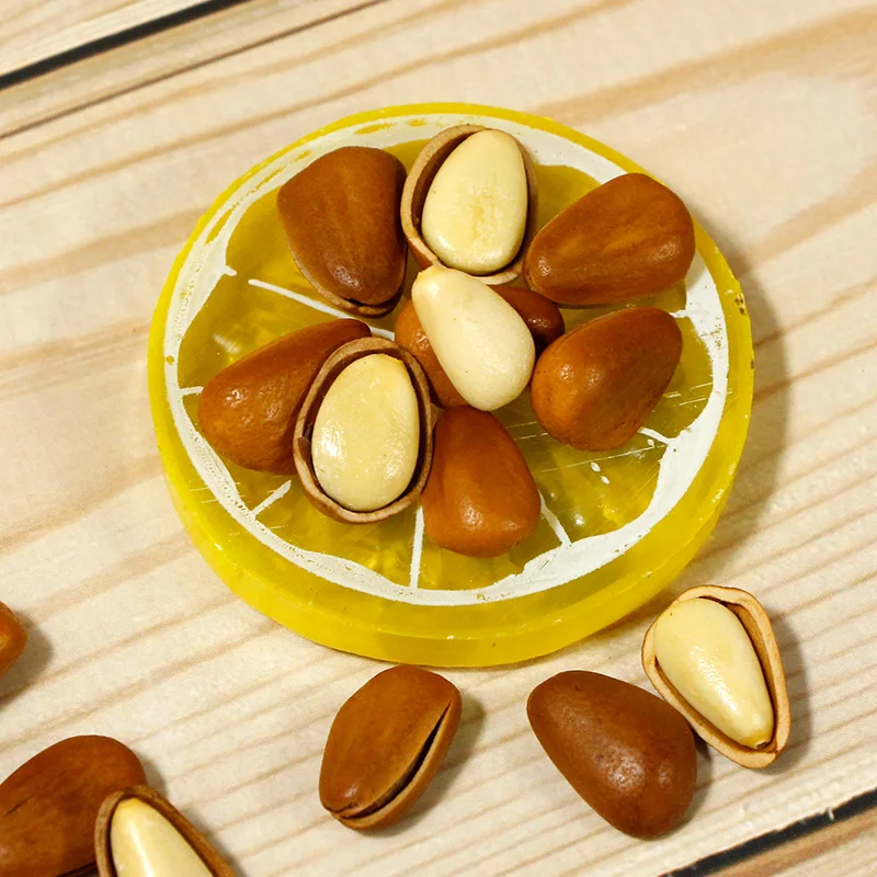 Wholesale quality pure natural organic fresh open pine nuts, the lowest price of the whole network