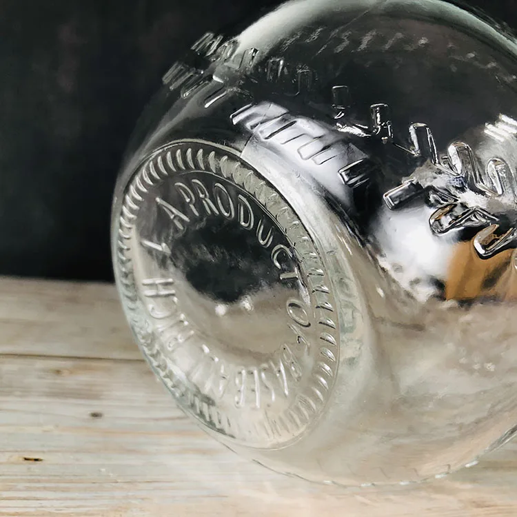 Ball Shape Whisky 750ml Custom Embossed Clear Glass Liquor Bottle