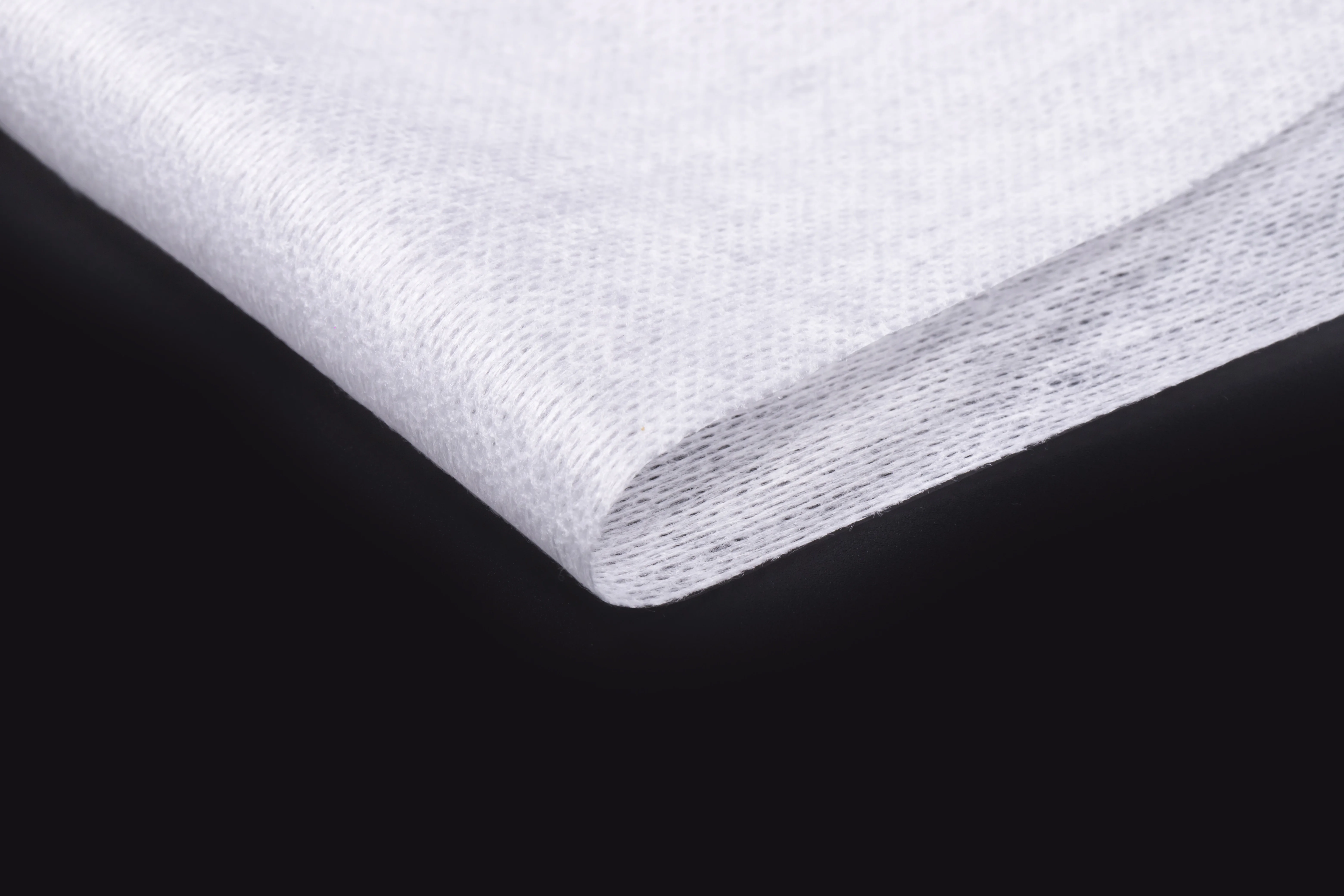 Polyester Non-Woven Fabric Roll Water Spunlace Non-Woven Fabric Wet Tissue Paper Material Soft Thin Surface Skincare