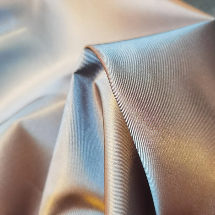 Парчовая ткань цвета шампанского полиэфирная текстильная для одежды светоотражающая саржа двухцветная