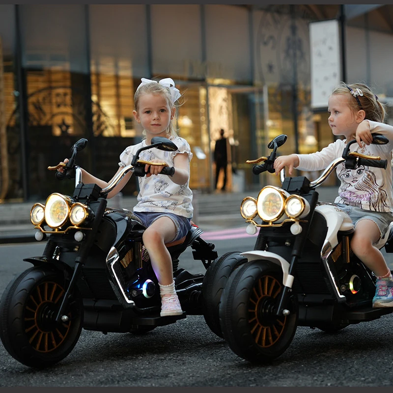 Customizable boys and girls can ride on a large Harley electric scooter that has three wheels and can be filled