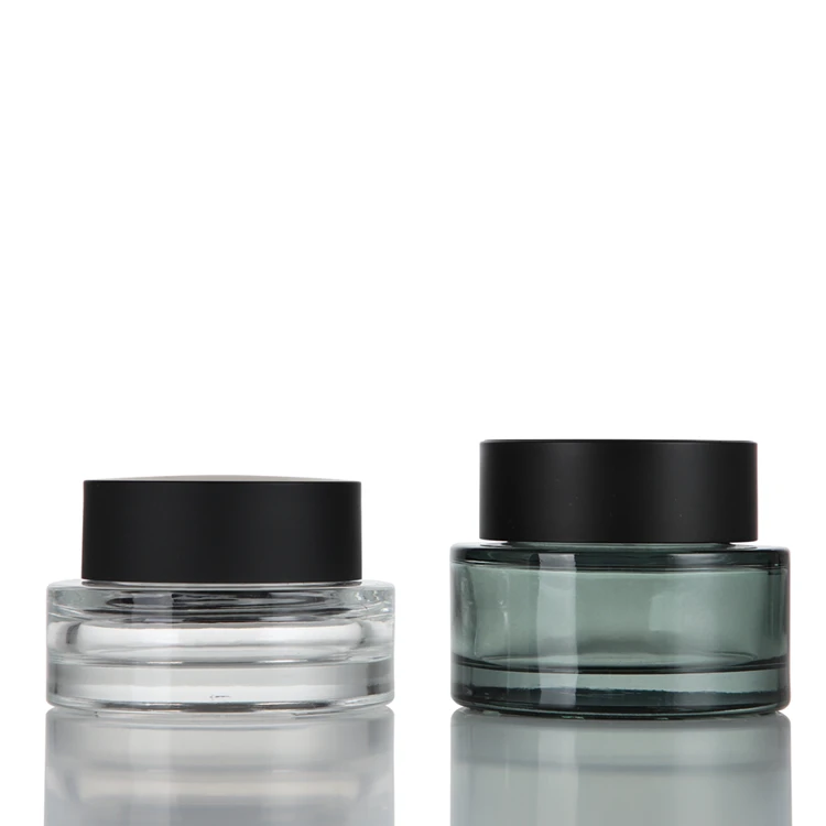 New arrival 30ml 50ml dark green transparent thick bottom glass cosmetic cream jar with spiral lid