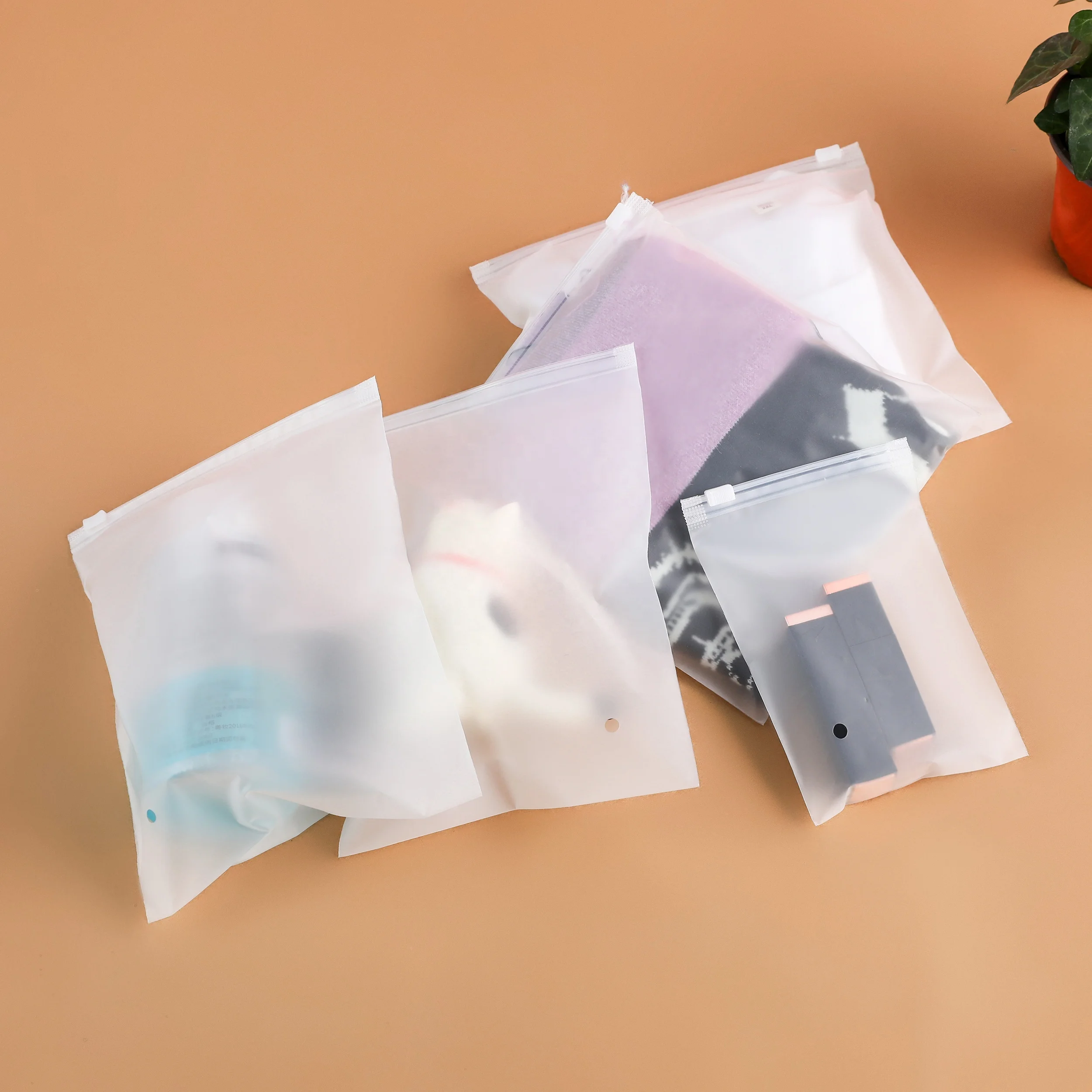 Printed logo custom pouches clothing packaging bag clothes hdpe plastic garment packing plastic bags with zipper slide zip lock