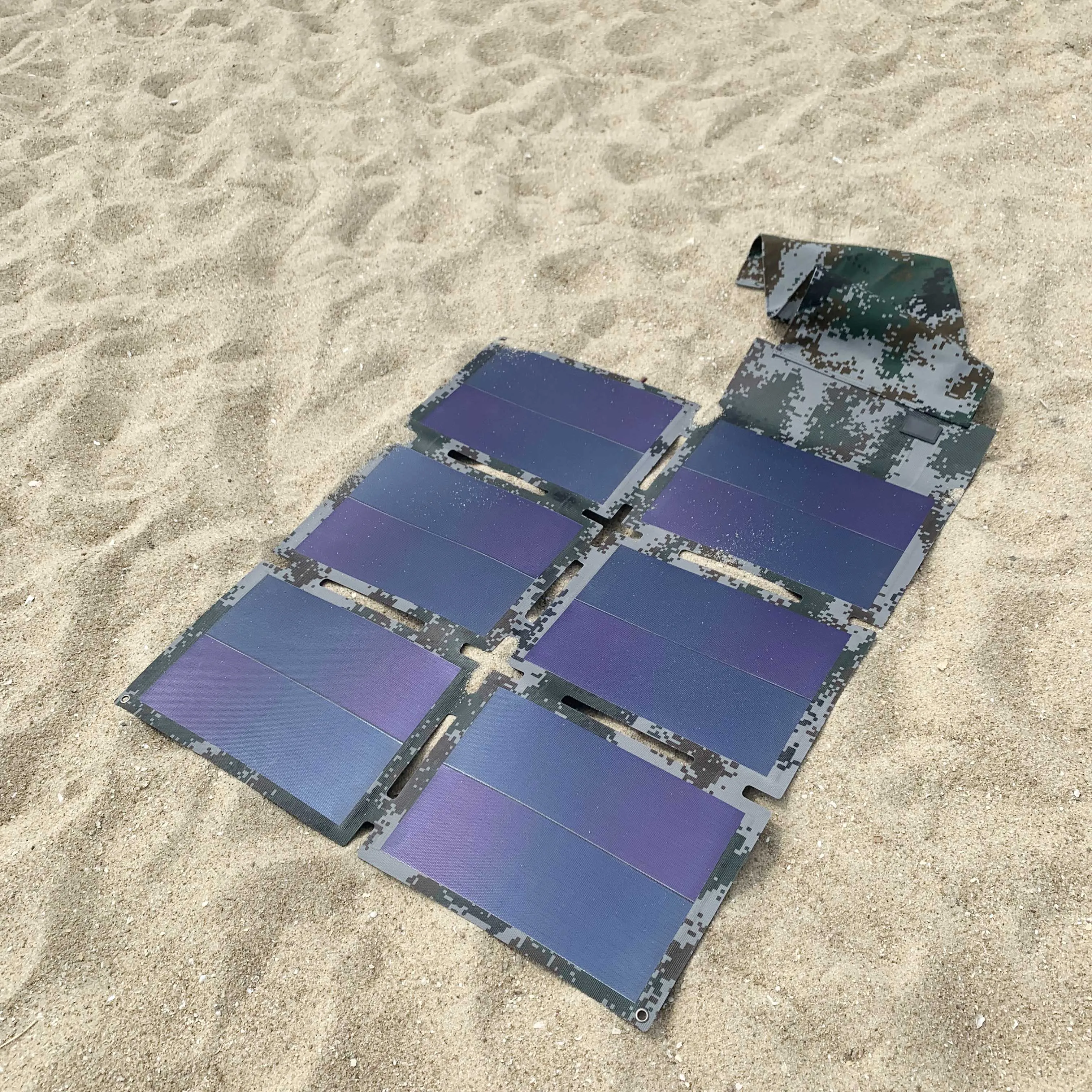 Flexible Portable Solar Powered Battery Charger Charging For Batteries In Desert