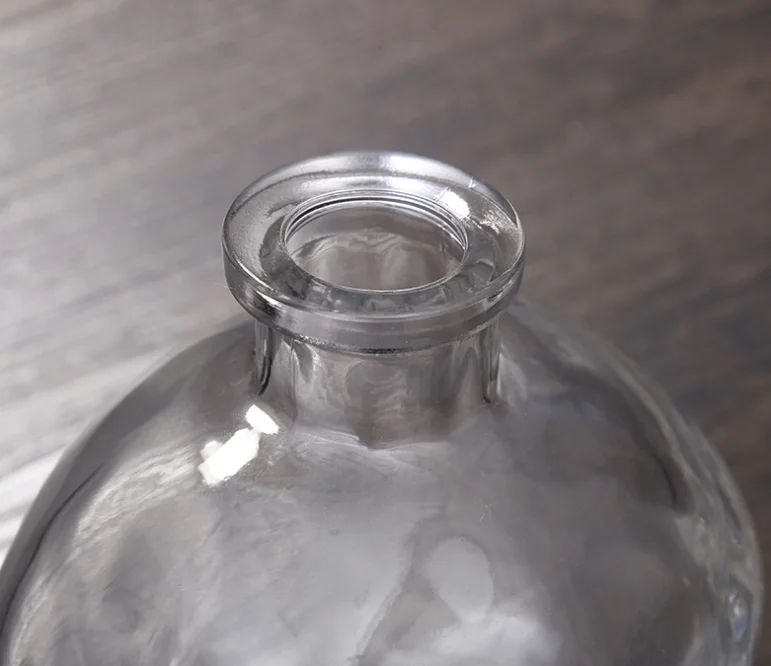 Factory direct sales skull shape clear glass Unique design 750ml glass whiskey vodka decanter glass bottle with caps