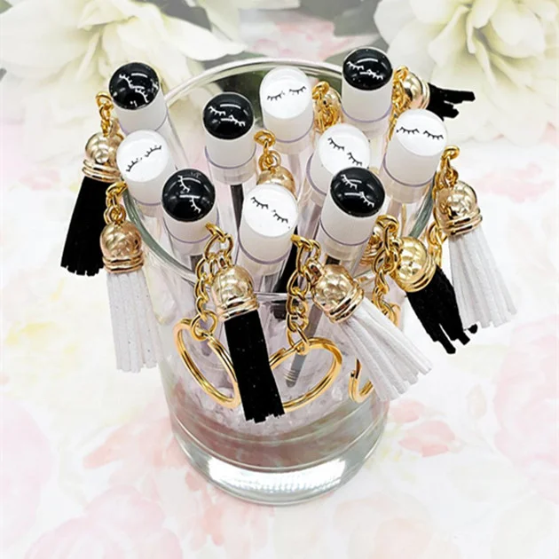 Wholesale OEM lash spoolie unique eyelash brush empty mascara tubes with brush keychain
