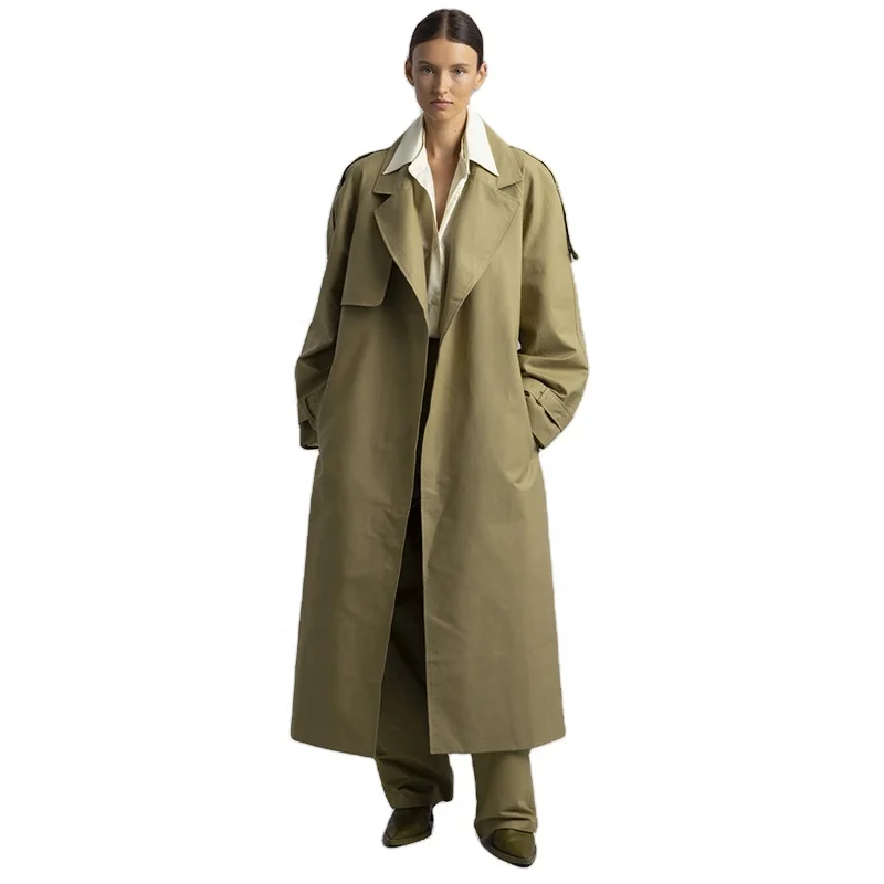 Khaki cotton trench Oversized silhouette Storm flaps Adjustable belted cuffs High vented back Front pockets trench coats women
