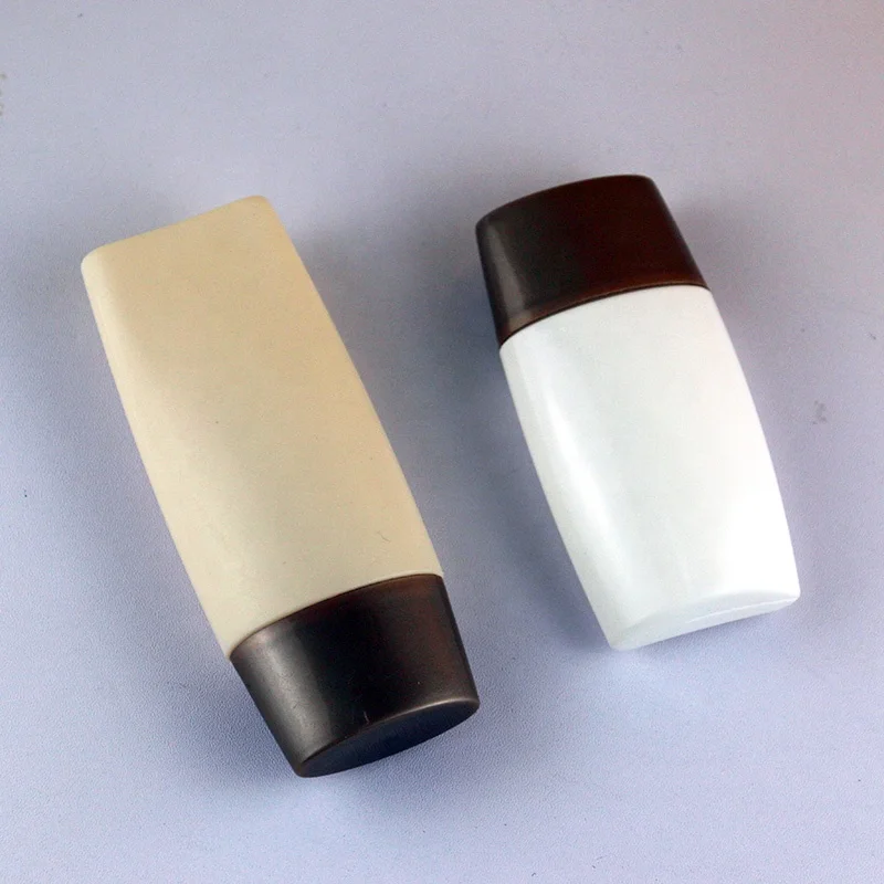Cosmetic Packaging 30ml 50ml Soft Touch Plastic Oval Shape Sunscreen Bottle for Sunblock Skin Care Container