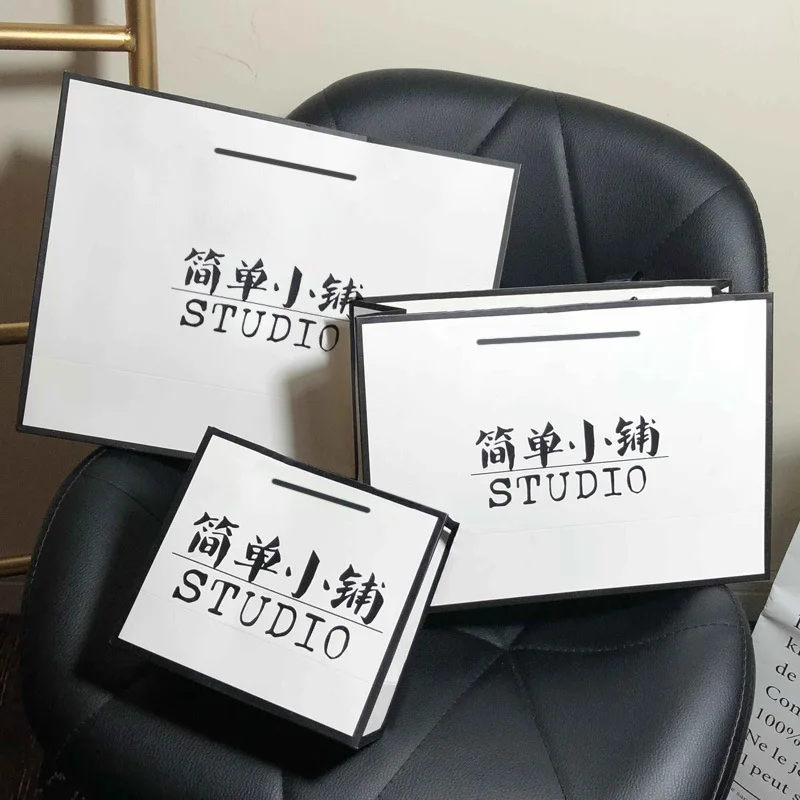 Wholesale Custom Packaging Bag For Clothing Brand Luxury White Jewellery Paper Gift Shopping Bag With Handles Printed Your Logo
