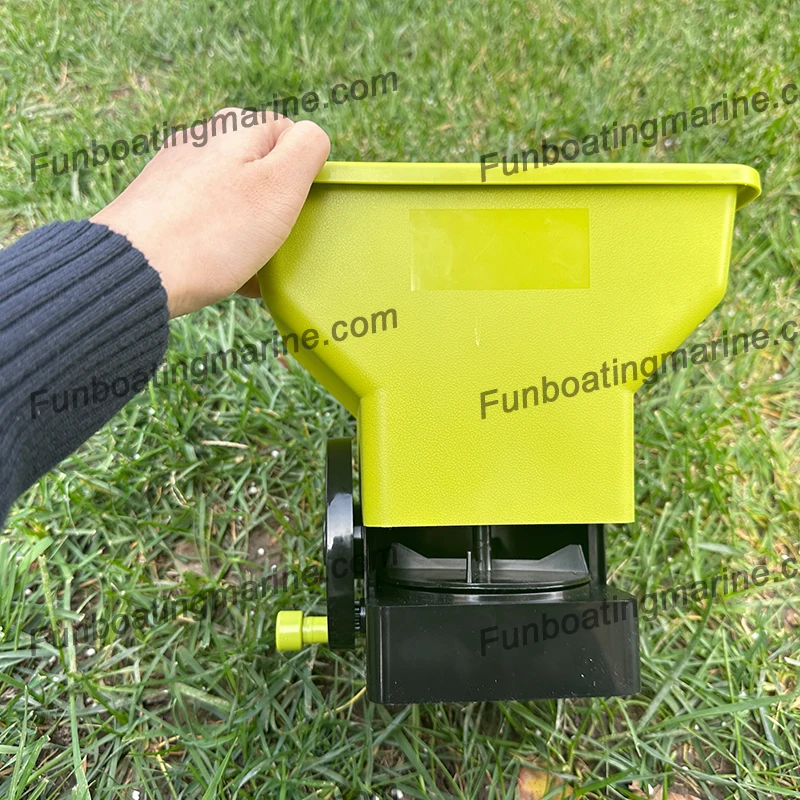 Hand-held spreader for fertilizer lawn lawn and fertilizer seed spreader