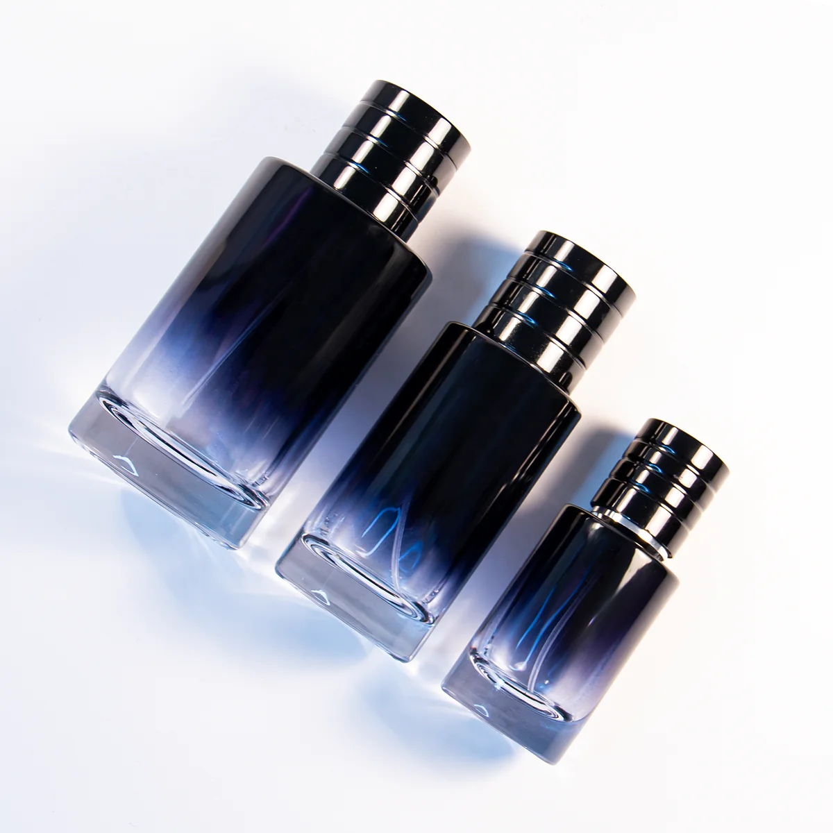 Custom Luxury Gradient Color Dark Blue Cylindrical Glass Perfume Bottle 30ml 50ml 100ml Arab Style Luxury Round Perfume Bottle