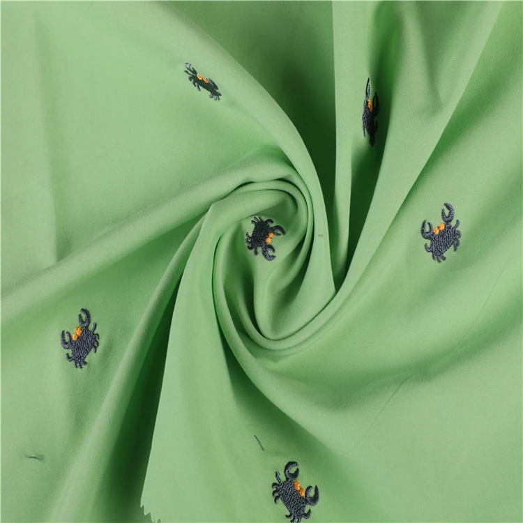 
100% polyester 75D*150D twill microfiber peach skin embroidered beach shorts fabric 