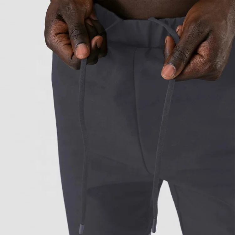 Fitness Training Active Wear Lightweight Joggers Reflective Stripe Zipper Bottom 100% Nylon Track Pants For Men