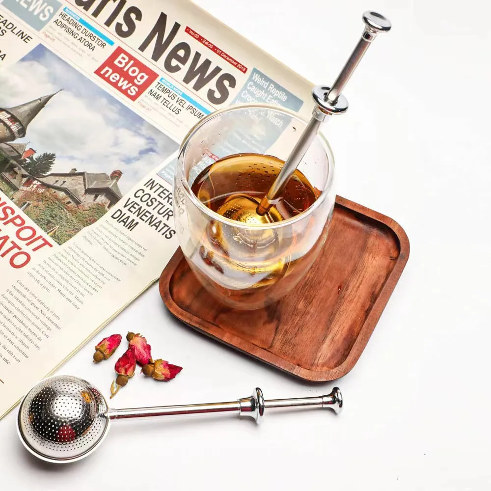 sells Chinese production of food grade stainless steel 304 press type retractable tea filter tea infuser