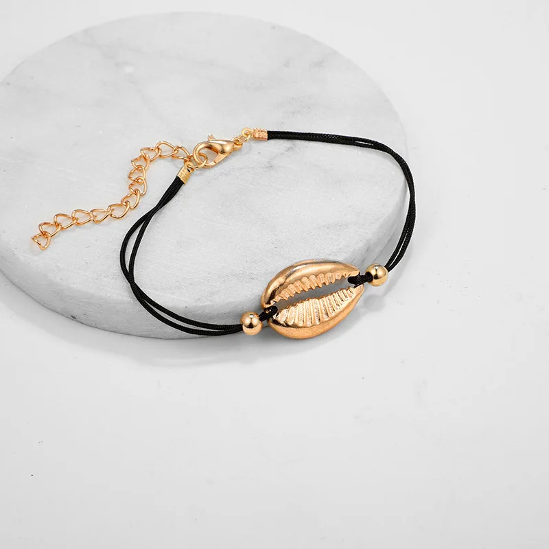 
Wholesale and retail European and American metal shell conch aircraft globe map round bracelet six - piece set 