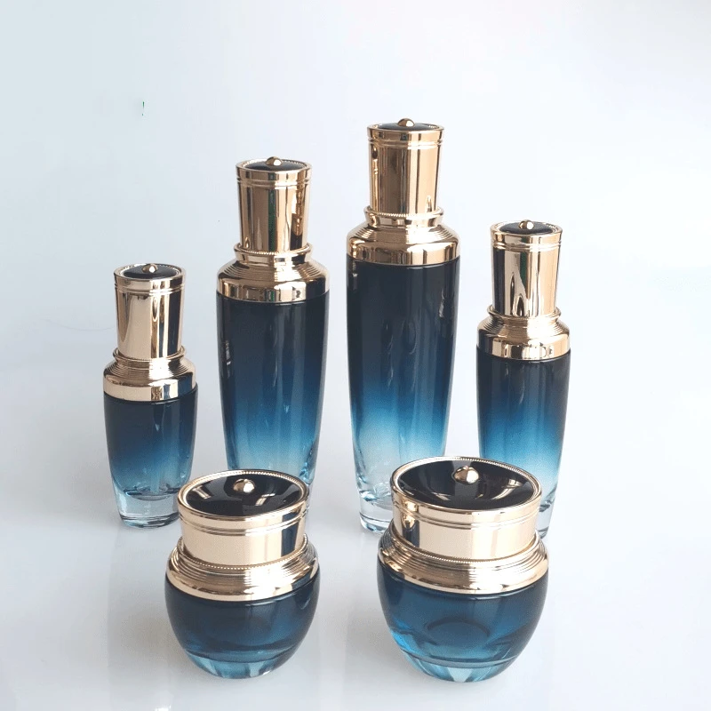 30ml 50ml 100ml 200ml Hot Sale  Custom Green Glass Skincare Empty Jar Packaging Bottle Set Lotion Face Cream Toner Bottles