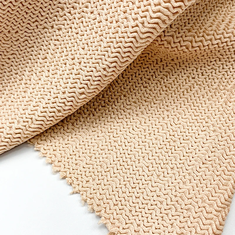 4 way stretch nylon spandex twist seersucker knit soft bikini swimwear jacquard fabric for dresses