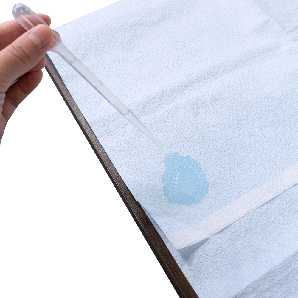 Factory direct sale cheap disposable blue water-resistance sms short sleeve medical paper patient gown cape for clinic