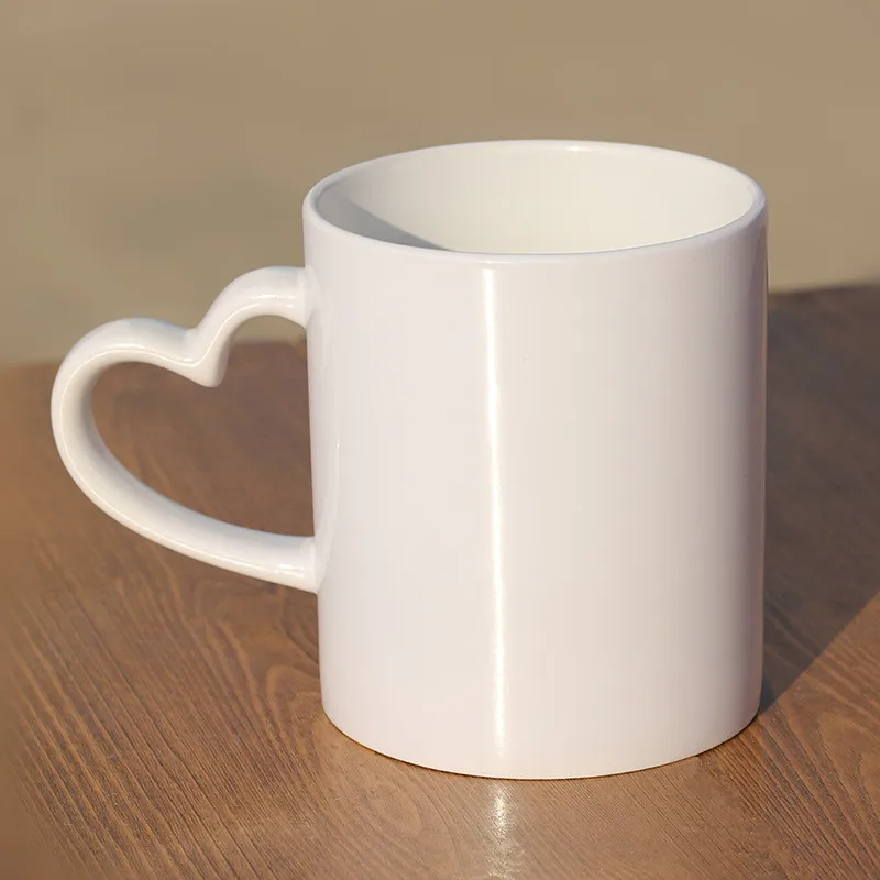 Heart Shaped Handle White Cup/Mugs Ceramic Mugs Coated Cup Thermal Transfer Cups Wholesale with Custom/LOGO Gift