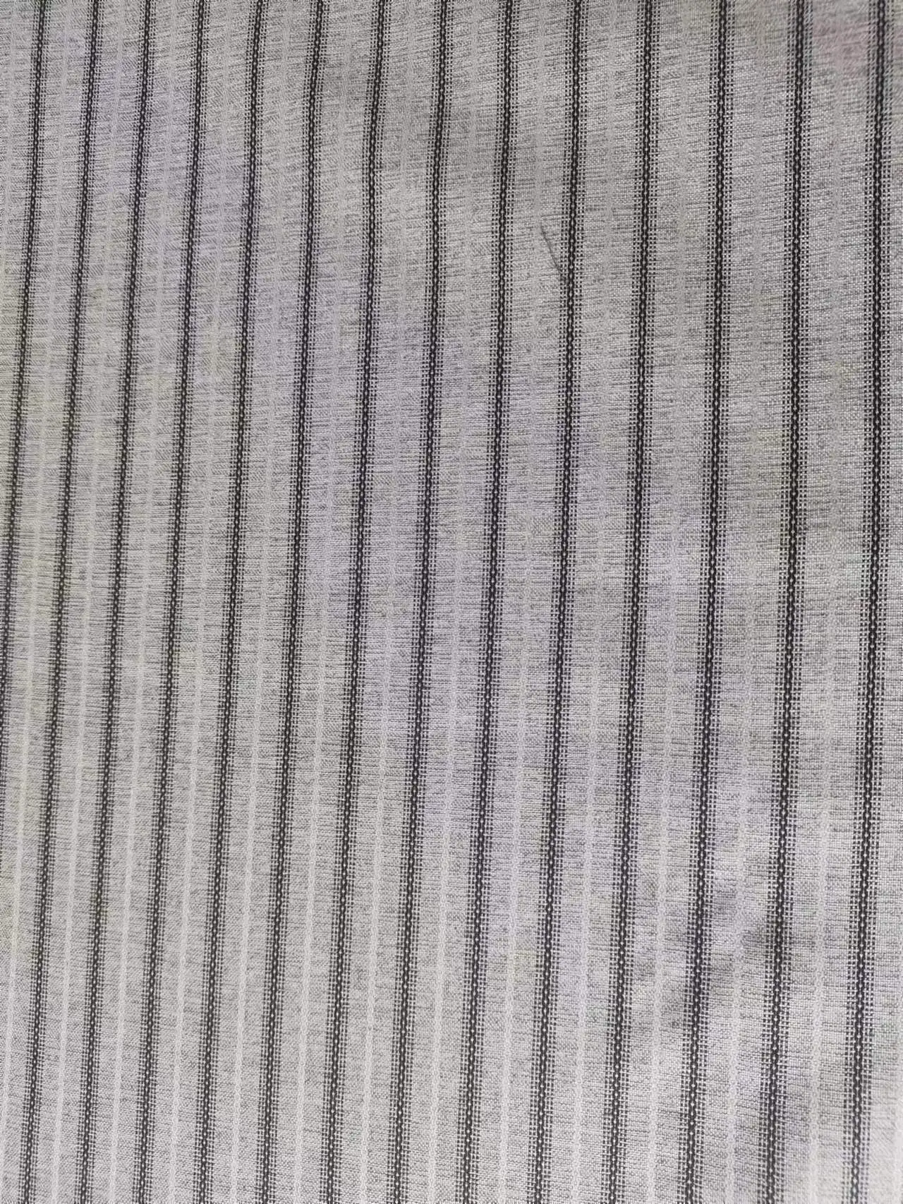 New Design Soft Hand Fee T/R Blended Yarn Dyed Jacquard Fabric for Overcoat Garment