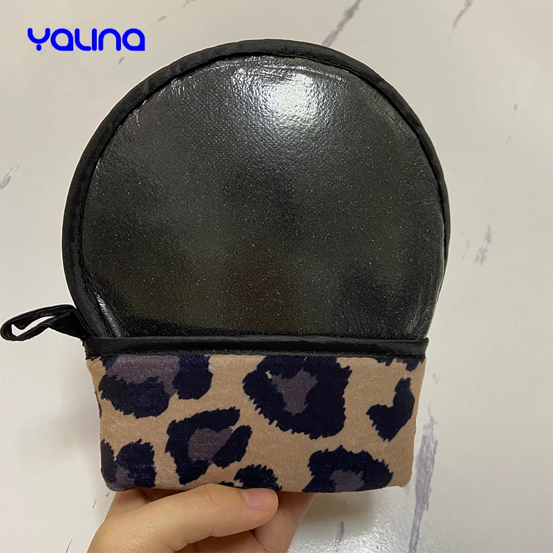 Reusable applicator glove evenly applies natural bronzed streak free appearance Leopard tanning mitt