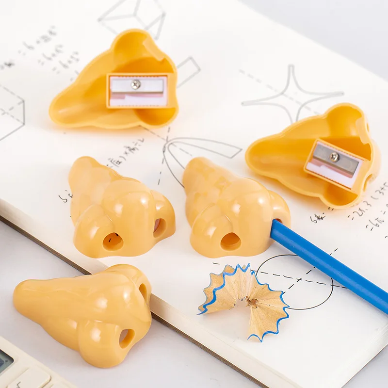Novelty shape single hole plastic funny nose pencil sharpener for school
