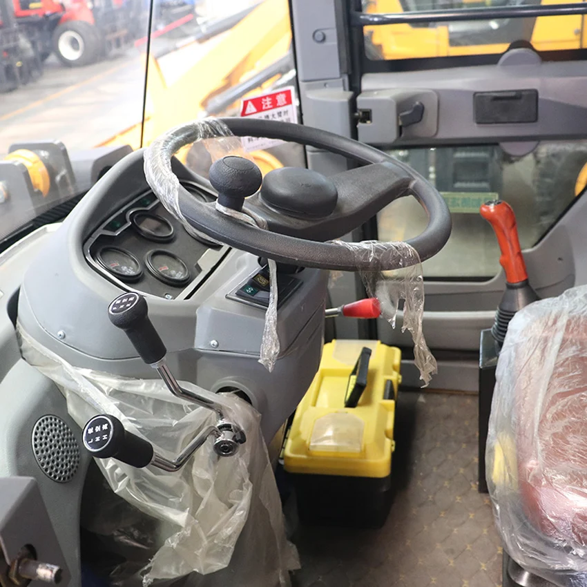 Chinese manufacturer produces small multi-functional wheel loader. The loader can be customized and can lift 700kg.