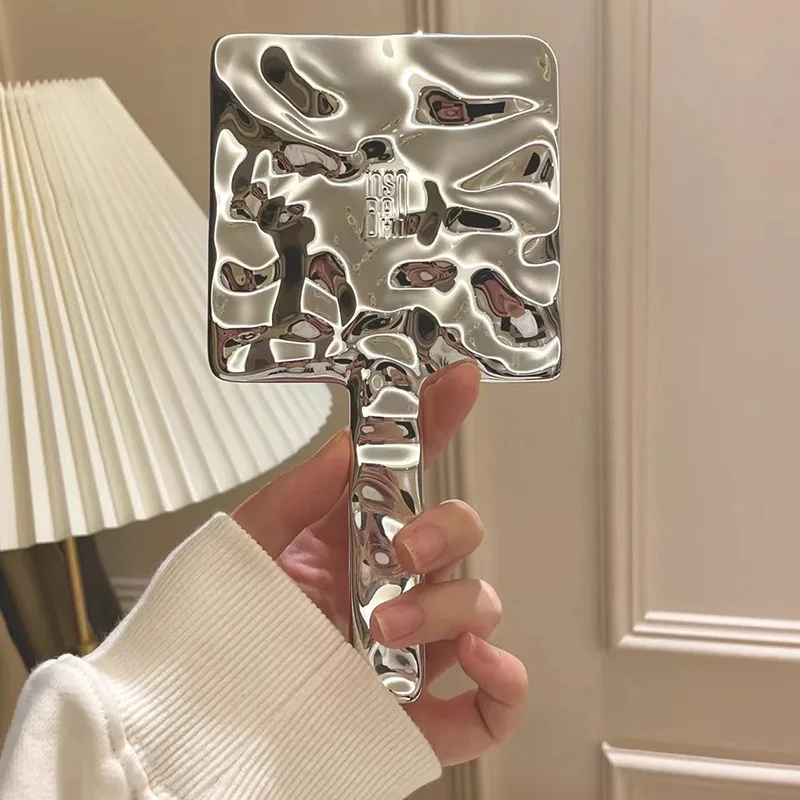 Ins Fashion Hot Seller Electroplating Finish Water Wave Flawless ABS Handheld Makeup Cosmetics Mirror Personalized Label
