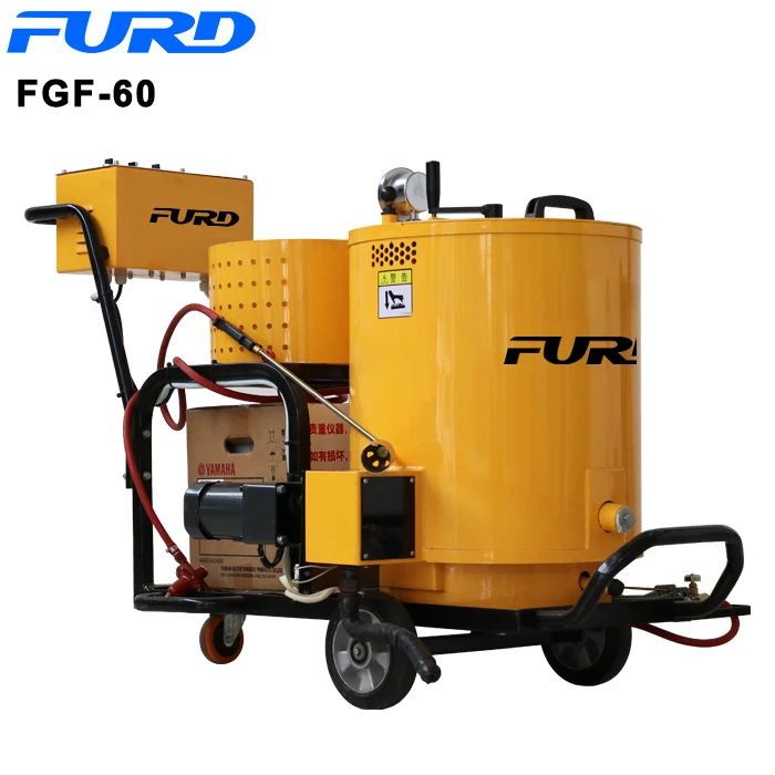 Hot pour sealing machine for asphalt and concrete cracks