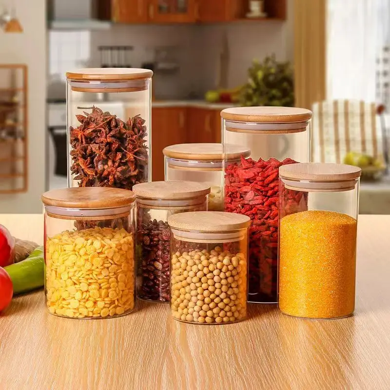 hot sell heat resistant high borosilicate kitchen containers cylinder glass sealed food cereal storage jar with bamboo lid