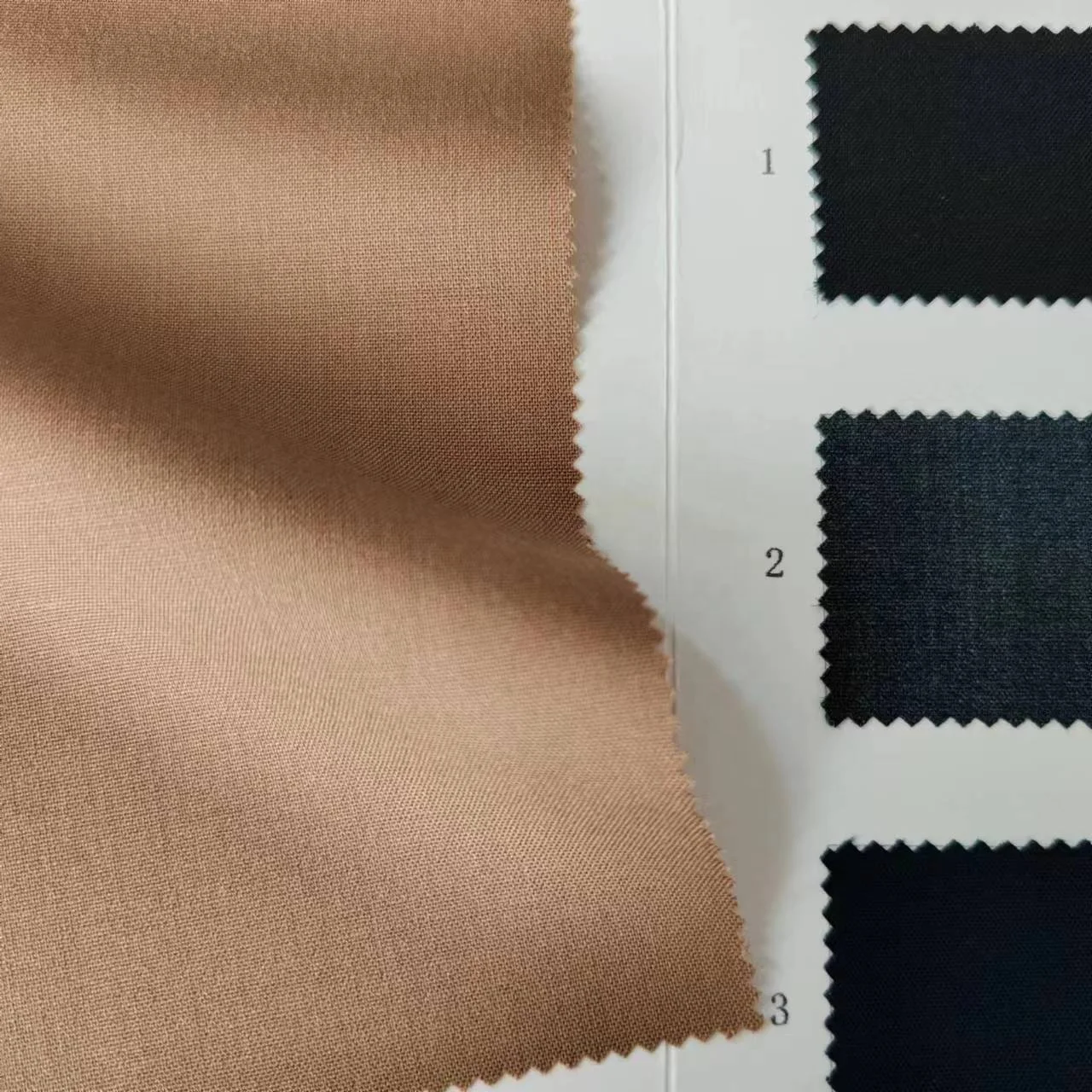 40% Wool 29% Polyester 28% viscose 275g/m spot worsted plain summer light stretch suit jacket wool fabric