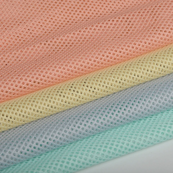 65GSM Четырехугольная полиэфирная ромбическая сетчатая ткань для внутреннего кармана