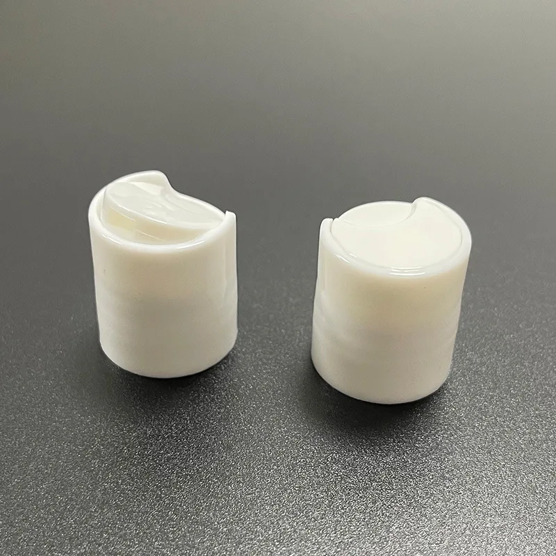 Wholesale custom PP Cosmetic Makeup Ready to ship in stock disc top cap 18/410 Disc Top Cap For Shampoo Bottle Cap