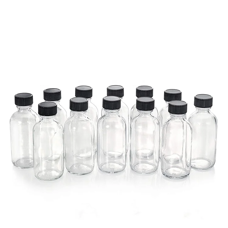 Wholesale 2oz Small Foundation Clear Glass Boston Round Sample Serum Bottles with Lid Essential Oil Bottle