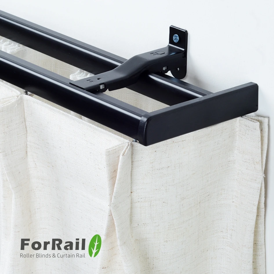 Curved curtain track and black curtain rail