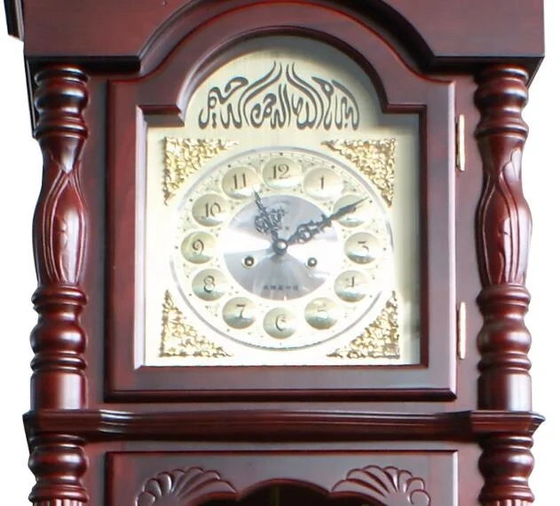 Wooden Floor Grandfather clock crafted from select hardwoods and veneers with a rich Rustic Cherry finish distressed detailing