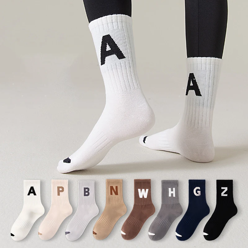 Autumn winter combed cotton jacquard embroidery sports socks custom logo women men crew socks