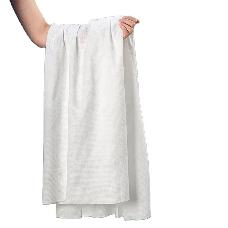 Disposable body care cloths with good absorbency for use in a variety of locations Highly soft spun nonwoven fabrics