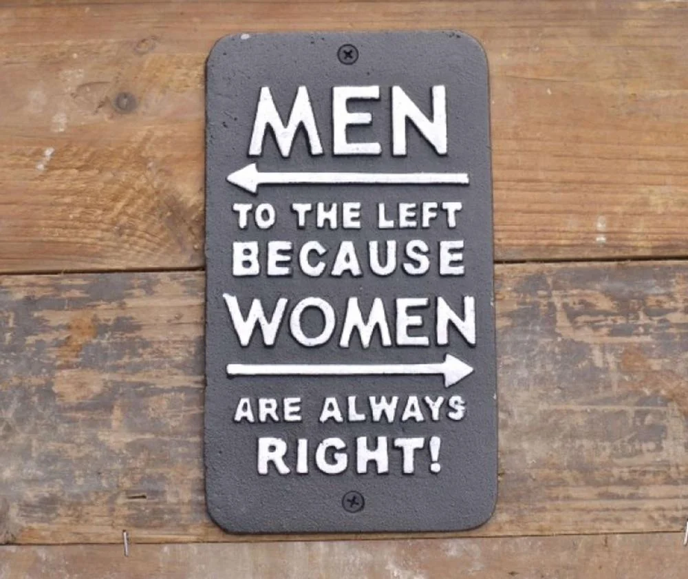 
Cast Iron wall hanging Women Right sign 