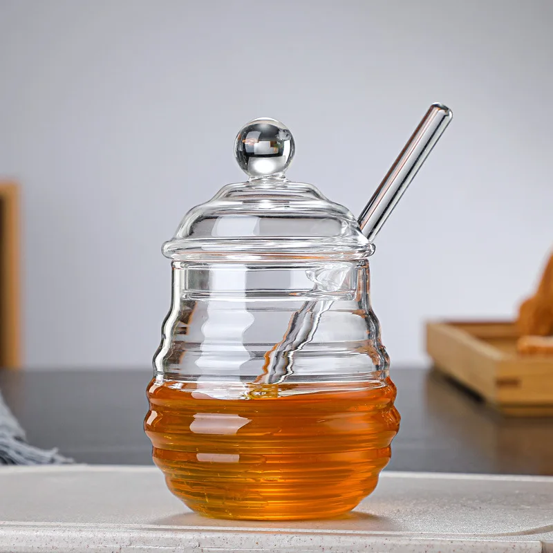 Wholesale household high borosilicate glass honey jar with lid glass stirring stick Honey bottle Creative glass transparent jar