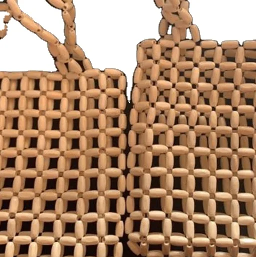 Wholesale Large Beach Hand Bag 2021 Summer Wood Bead Hand Weave Hollow Out Lady Casual Beaded Handbag
