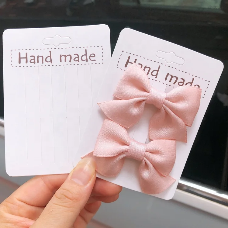 Customized high fashion hair accessories hair clip packaging paper displaying cards logo printed for pink bow scrunchies holder