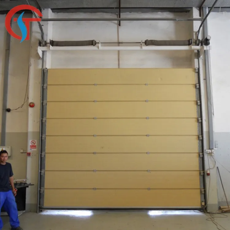 Warehouse industrial automatic sectional door with dock leveler