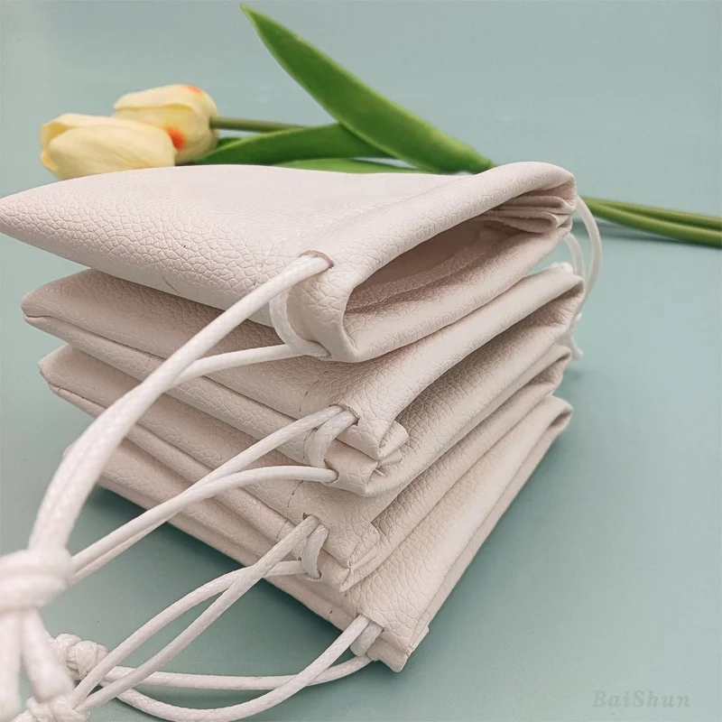 Hot Sale Custom Logo Emboss Pink Pu Leather Drawstring Bag Sunglasses Power Bank Waterproof Leather Pouch