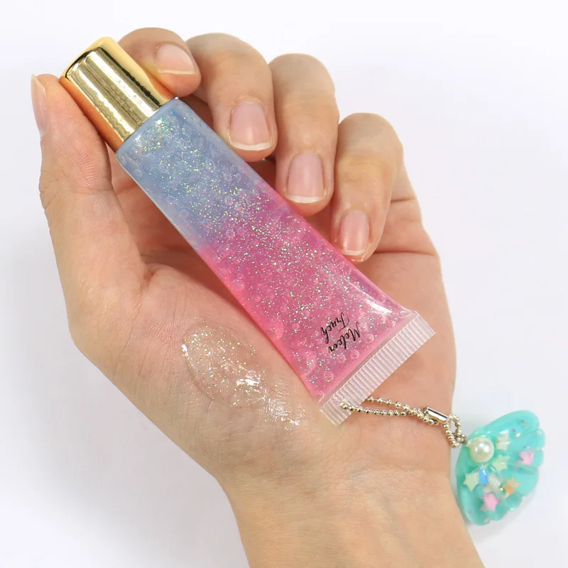 Strawberry Private Label Custom Logo 24 Hours Long Lasting Lip Gloss Vegan Cruelty Free Colored Fruit Lip Oil with Shimmer