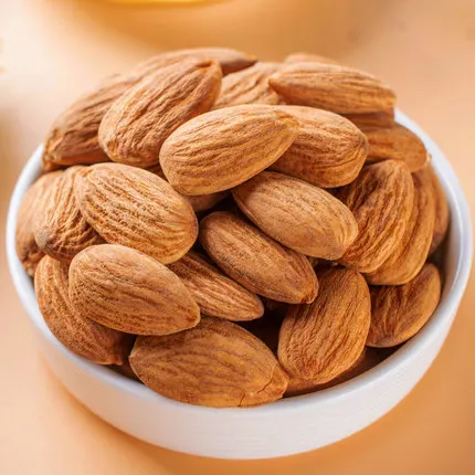 Wholesale Bulk Sweet Leaf Salt Baked Padan Wood Kernel Hull-Free Almonds Blanched and Fresh for Food Use