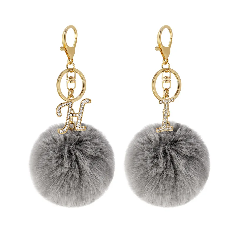 8cm popular new designs 26 English letters Keychain Faux Fur Pompon Keychain Women Rhinestone Leather faux Rabbit fur Ball