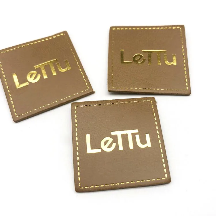 Suppliers embossed leather labels patches for bags and jeans